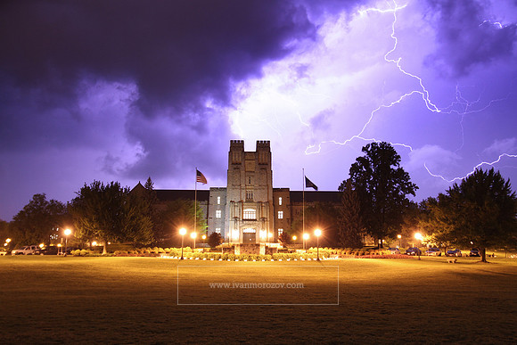 Lightning behind Burruss Hall and April 16th Memorial on the Drillfield at Virginia Tech.