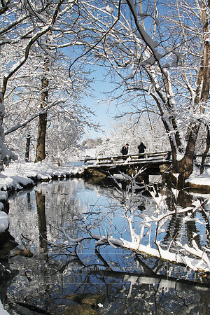 After a snowstorm at the Duck Pond. Bridge across Stroubles Creek. Virginia Tech.