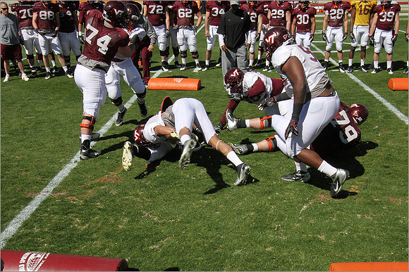 FB. 2013. Spring, football scrimmage at Virginia Tech.